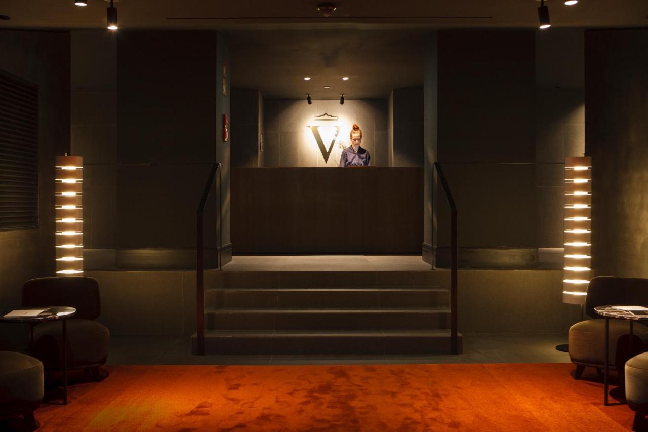 Kozmo Hotel Suites & Spa - Small Luxury Hotels Of The World Budapest Exterior photo The entrance to the V Club
