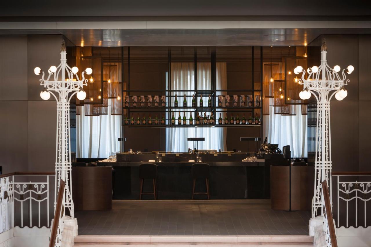 Kozmo Hotel Suites & Spa - Small Luxury Hotels Of The World Budapest Exterior photo The bar at the top of the staircase