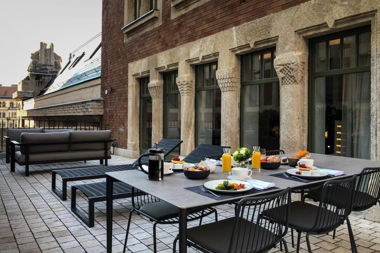 Kozmo Hotel Suites & Spa - Small Luxury Hotels Of The World Budapest Exterior photo The rooftop terrace