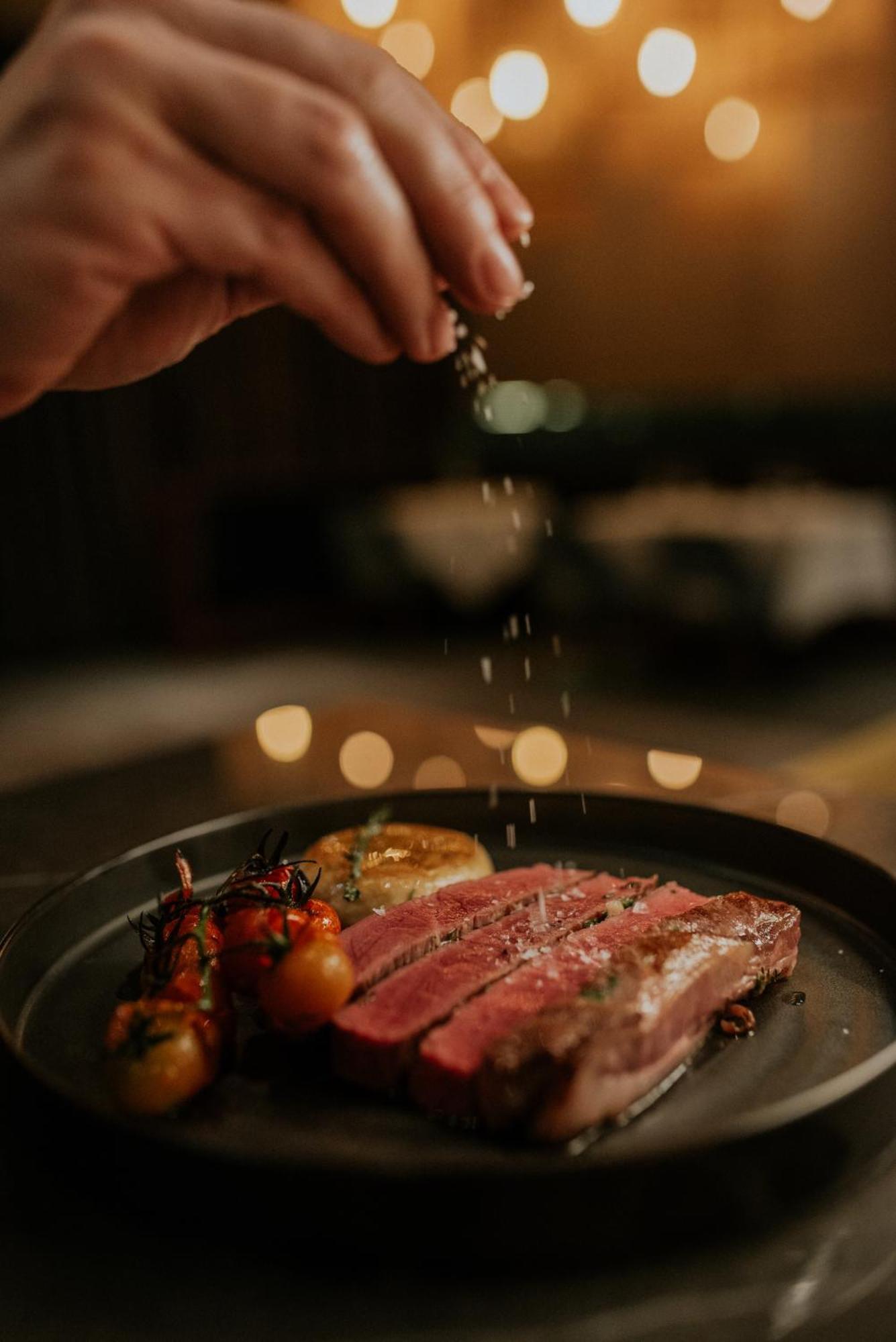 Kozmo Hotel Suites & Spa - Small Luxury Hotels Of The World Budapest Exterior photo Seasoning a steak