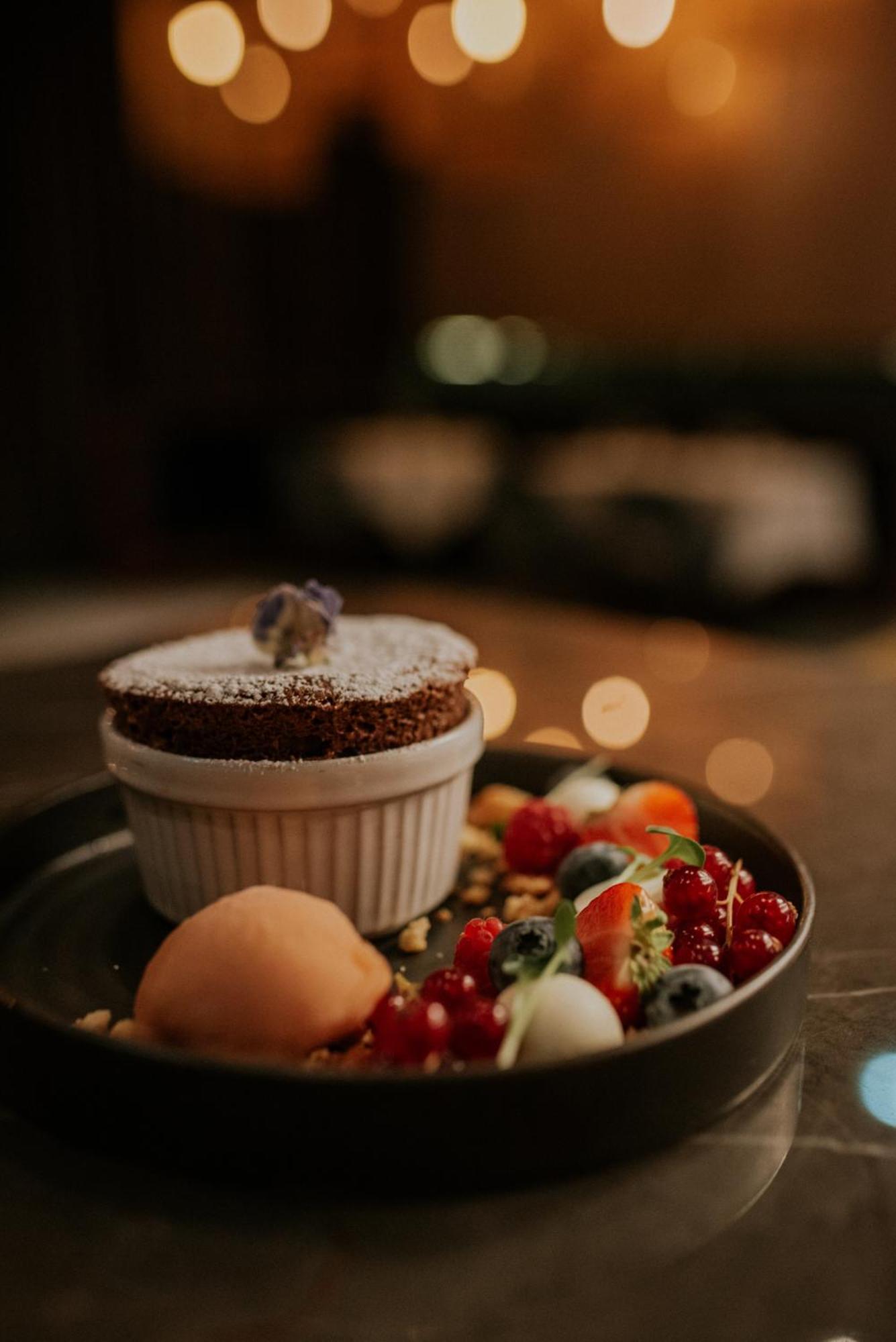Kozmo Hotel Suites & Spa - Small Luxury Hotels Of The World Budapest Exterior photo A chocolate soufflé