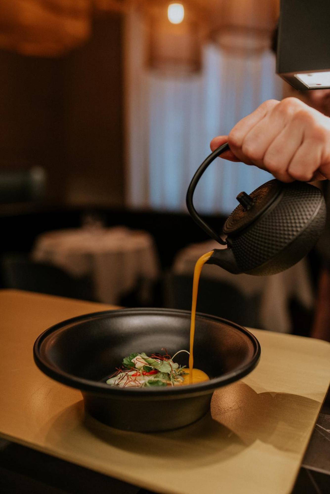 Kozmo Hotel Suites & Spa - Small Luxury Hotels Of The World Budapest Exterior photo Dashi being poured into a bowl