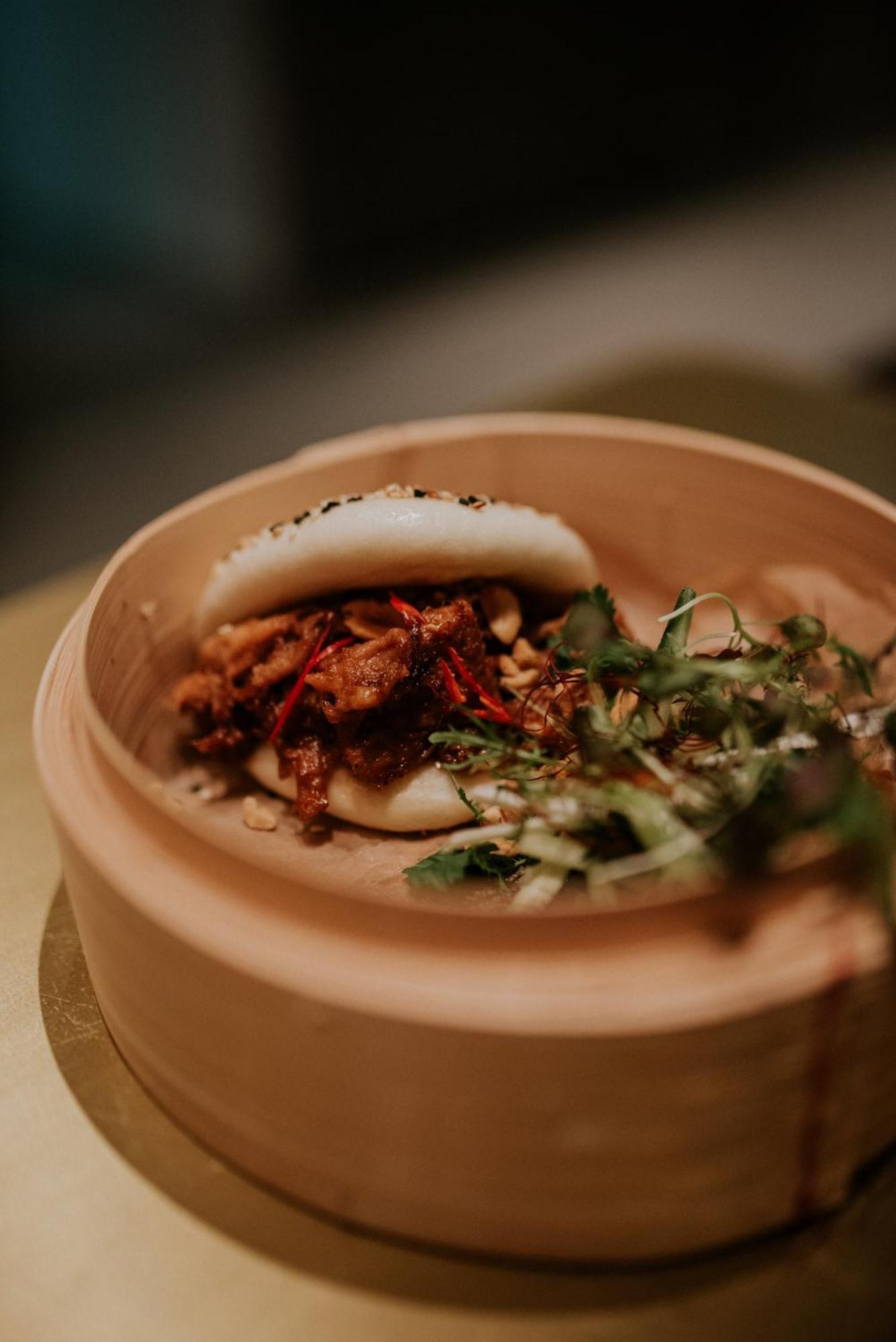 Kozmo Hotel Suites & Spa - Small Luxury Hotels Of The World Budapest Exterior photo A bao bun with braised duck